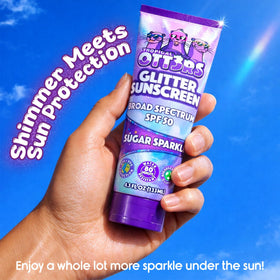 TROPICAL OTT3RS child applying sunscreen at beach for family-safe protection