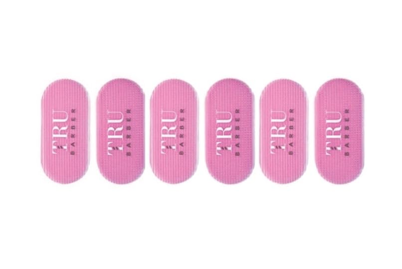 TRU BARBER front view of pink hair grippers showing compact design and secure hold