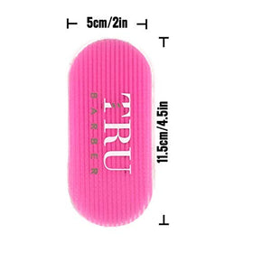 TRU BARBER hair grippers in stylist hand securing a hair section for cutting