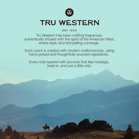 Tru Fragrance Beauty hand holding the 1.7 fl oz bottle to show Yellowstone Tornado scale
