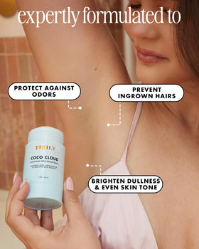 Truly Coco Cloud held in hand to show 3 oz size and travel convenience