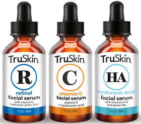 TruSkin application showing serum on fingers for precise, effective use