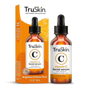 Flatlay of TruSkin Naturals bottle with moisturizer and sunscreen suggesting routine pairing