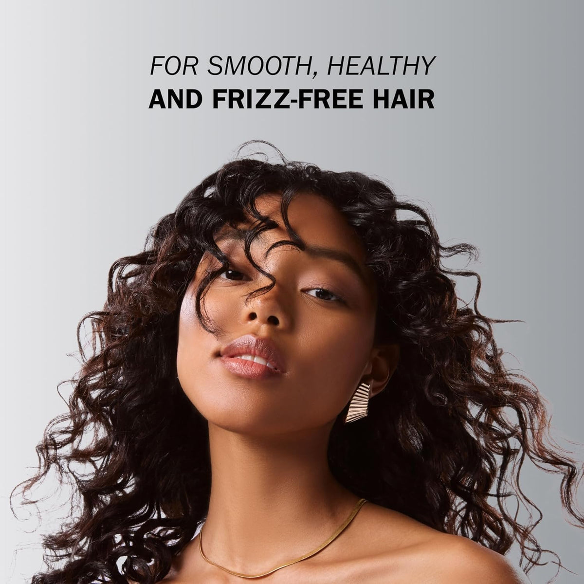 TRUSS being applied to damp hair demonstrating easy detangling and moisture delivery