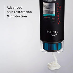 TRUSS creamy conditioner texture on palm showing rich hydration and spreadability