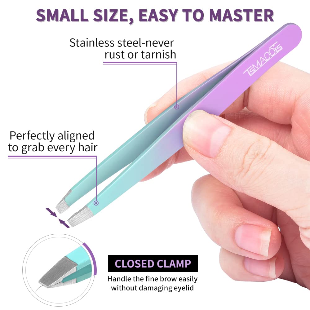 TsMADDTs double-sided eyebrow brush in hand demonstrating grooming control and blending benefit