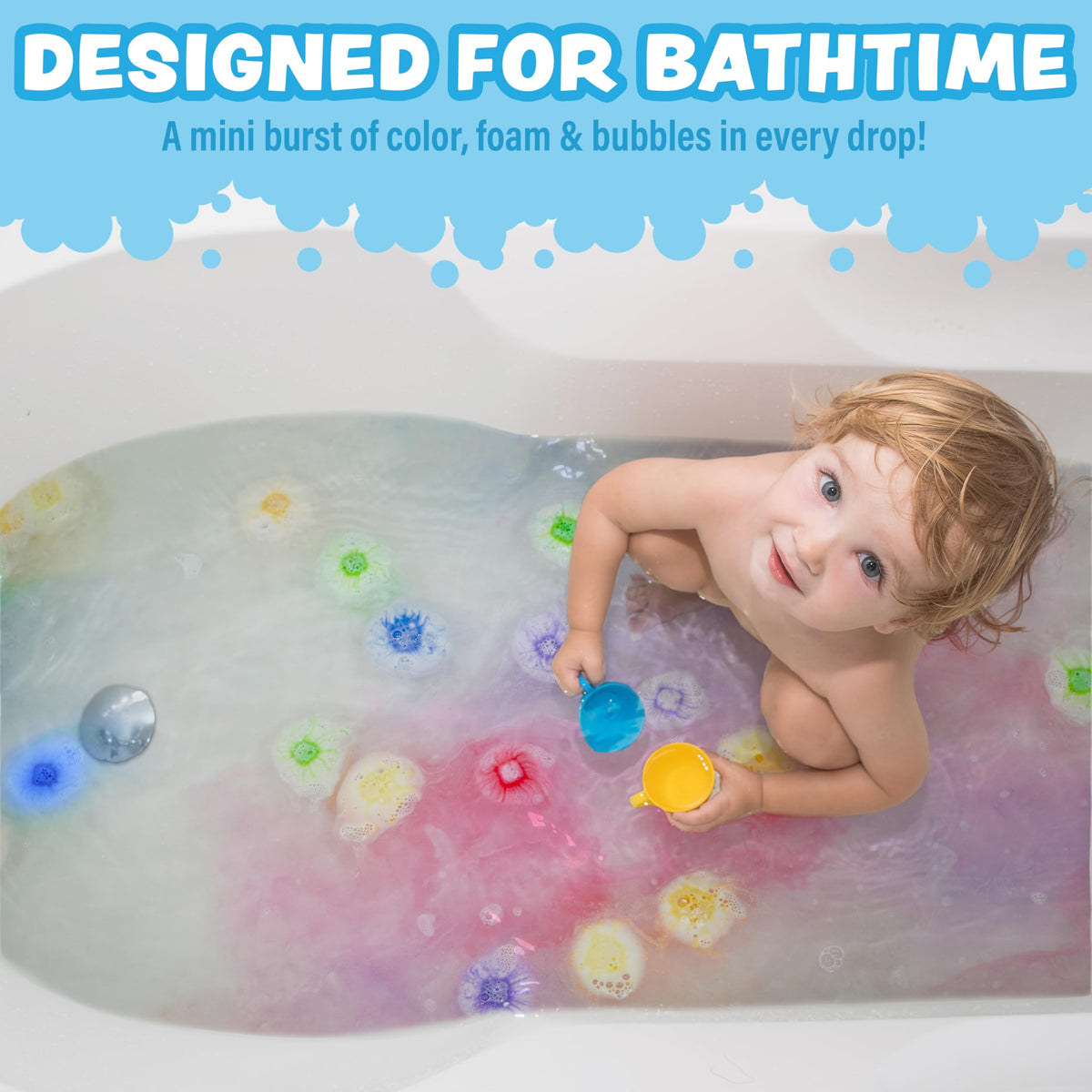 Tub Works Lil' Bursts fizzing and dissolving in bathtub, instant colorful foam