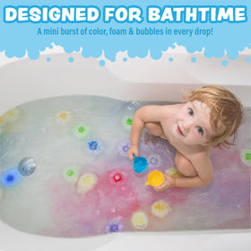 Tub Works Lil' Bursts fizzing and dissolving in bathtub, instant colorful foam