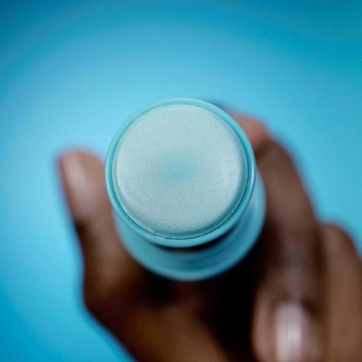 TULA eye balm application on finger demonstrating easy, mess-free swipe