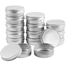 TUZAZO tin held in hand demonstrating compact 2 oz size for easy portability