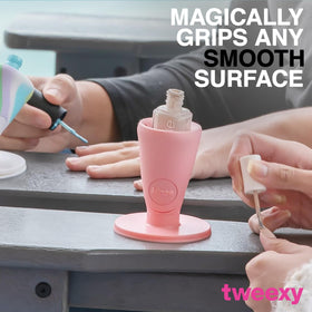 tweexy held in hand to show compact size and portability benefit