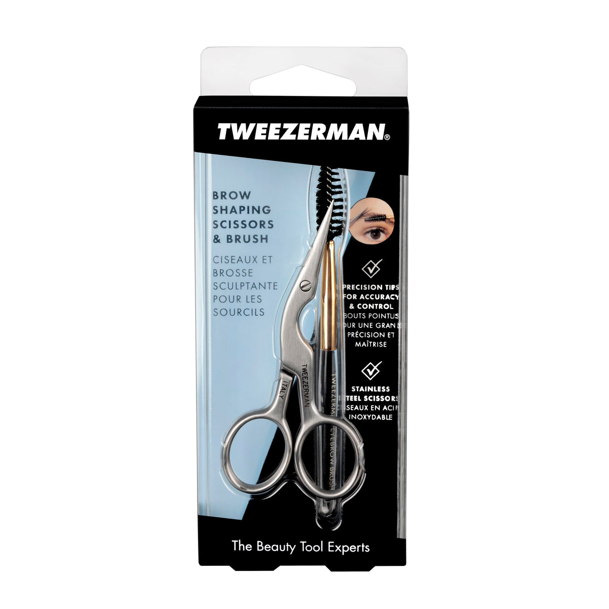 Tweezerman brush lifting brow hairs to reveal lengths for targeted trimming