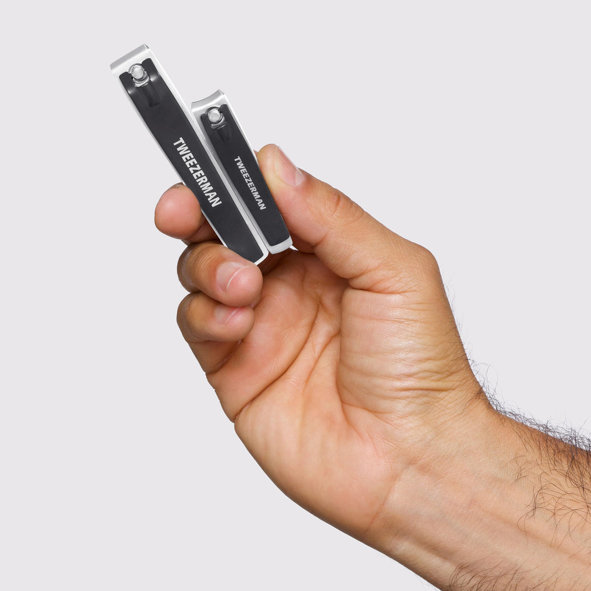 Tweezerman clipper lever rotated up showing ergonomic action and secure grip