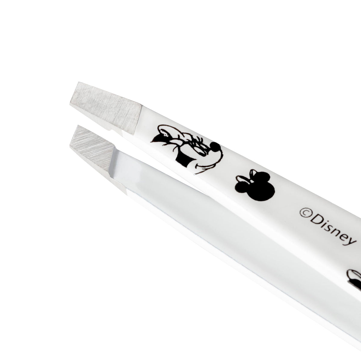 Tweezerman held in hand to show scale and comfortable ergonomic benefit