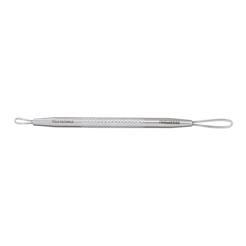 Tweezerman extractor front view showing dual ends and no‑slip handle for precise control
