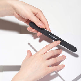 Tweezerman close-up of dual 180 240 grit surface demonstrating precise control