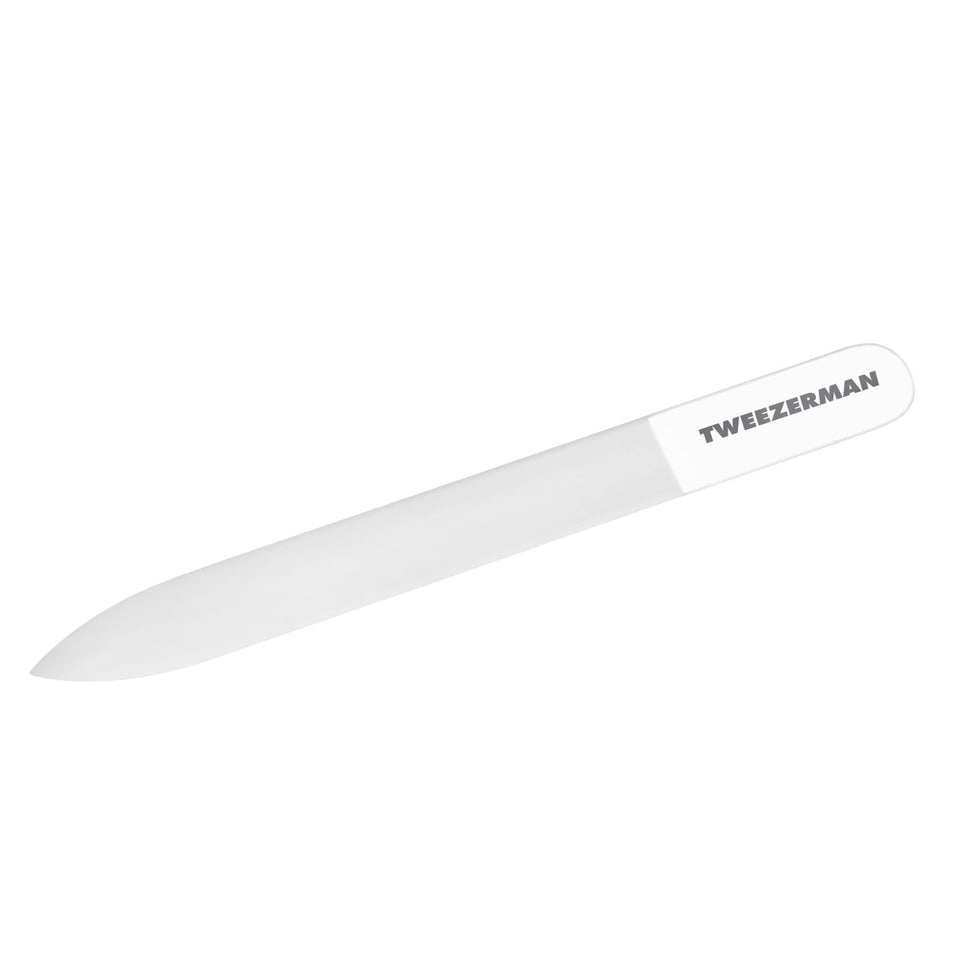 Tweezerman glass nail file front view showing sleek design and precision