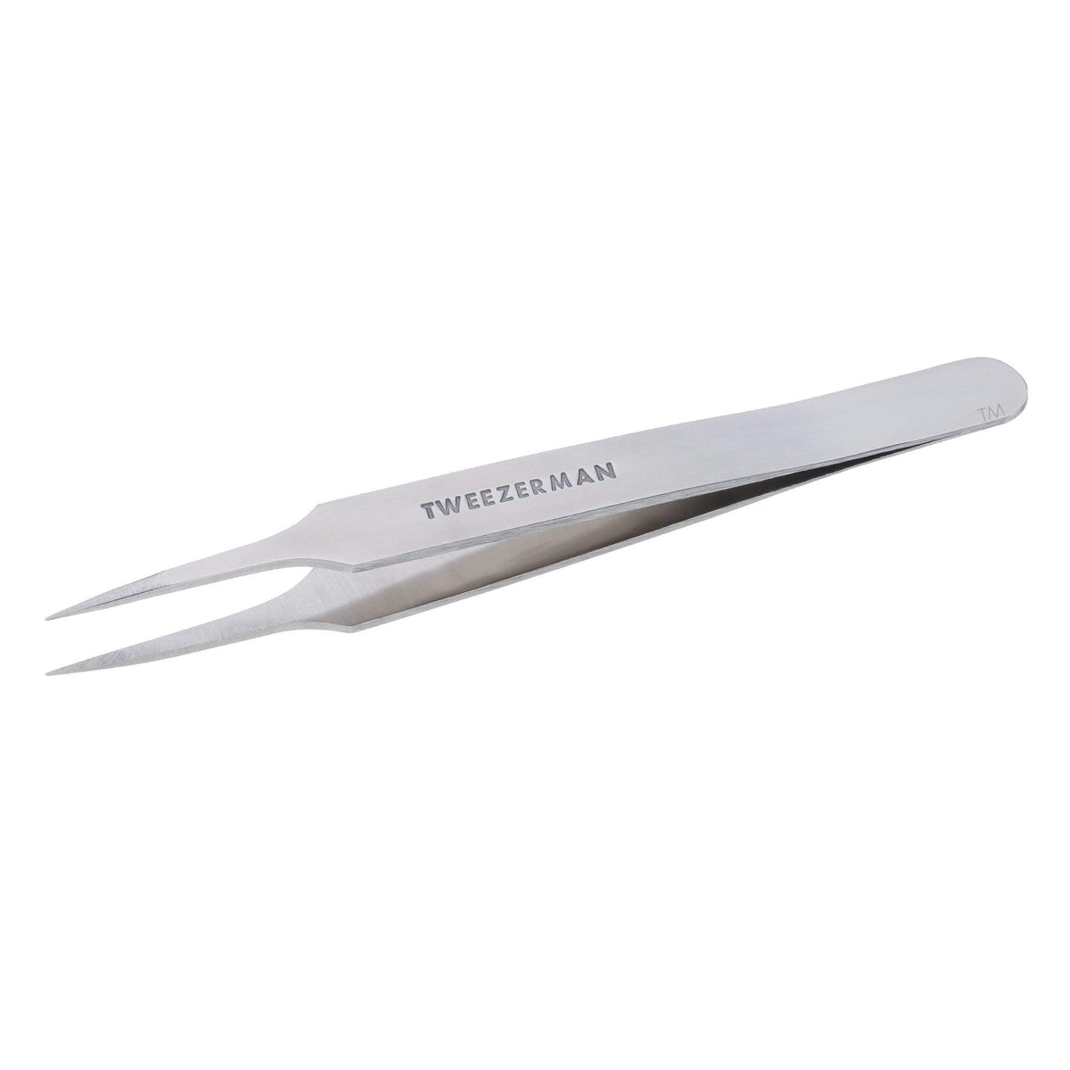 Tweezerman tweezer in use removing a small splinter with steady control