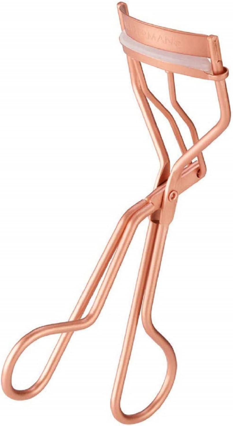 Tweezerman curler on bathroom vanity styled in a morning routine setting benefit