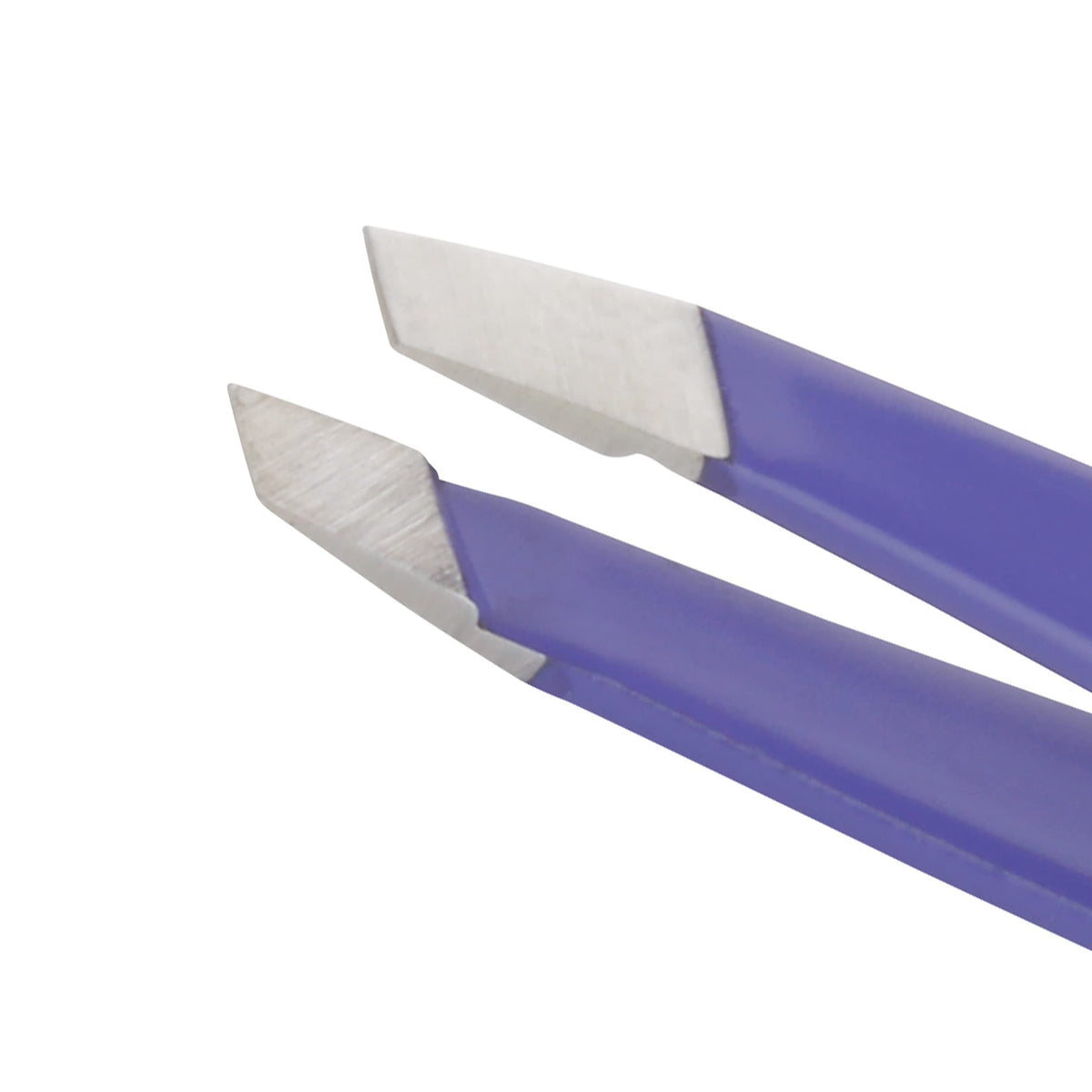 Tweezerman close-up of hand-filed slant tips showing precise hair grip benefit