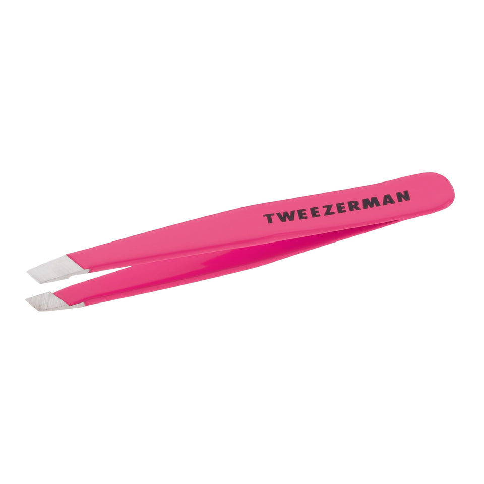 Tweezerman mini slant front view showing neon pink finish and precise tips benefit portability