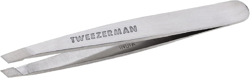 Tweezerman mini slant front view showing compact stainless-steel body and precise slanted tips for accuracy