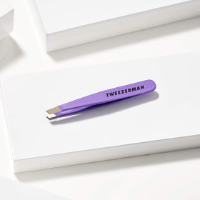 Tweezerman brushed metal finish detail highlighting durable quality benefit