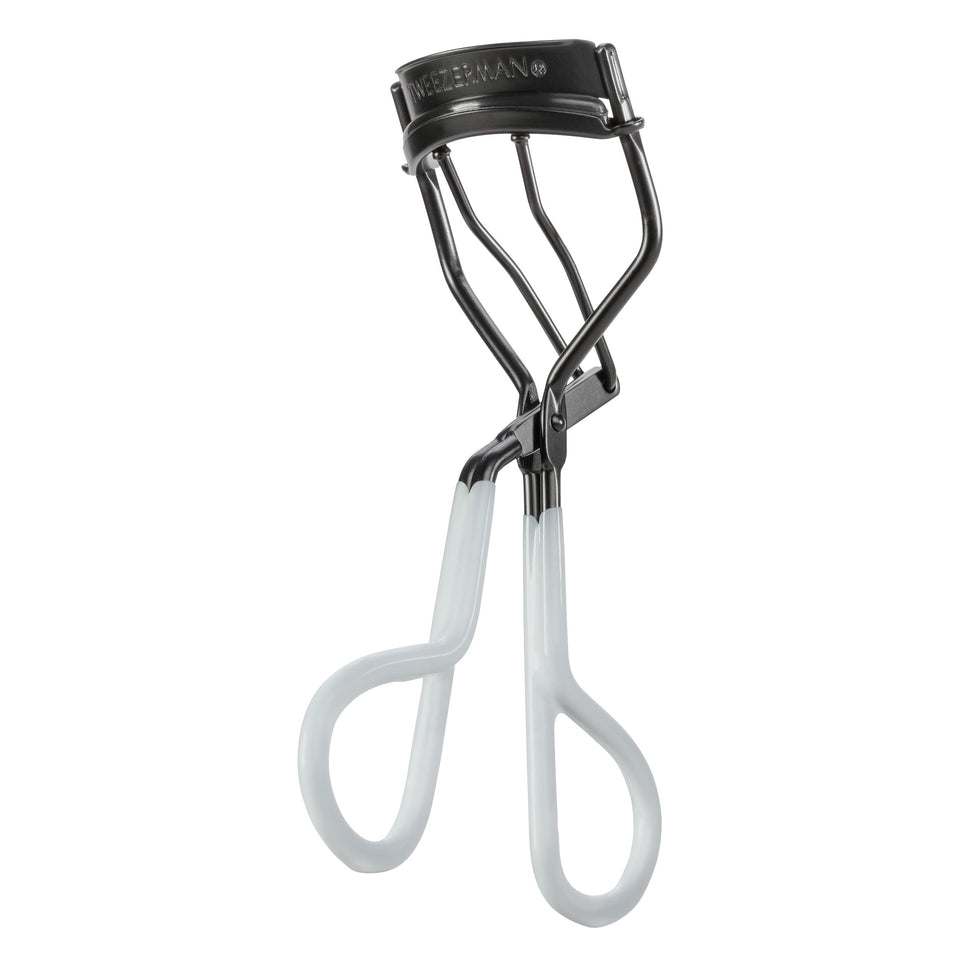 Tweezerman Onyx front-facing curler showing matte black finish and ergonomic grips for precision