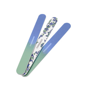 Tweezerman paisley front pack showing three colorful files and portability benefit