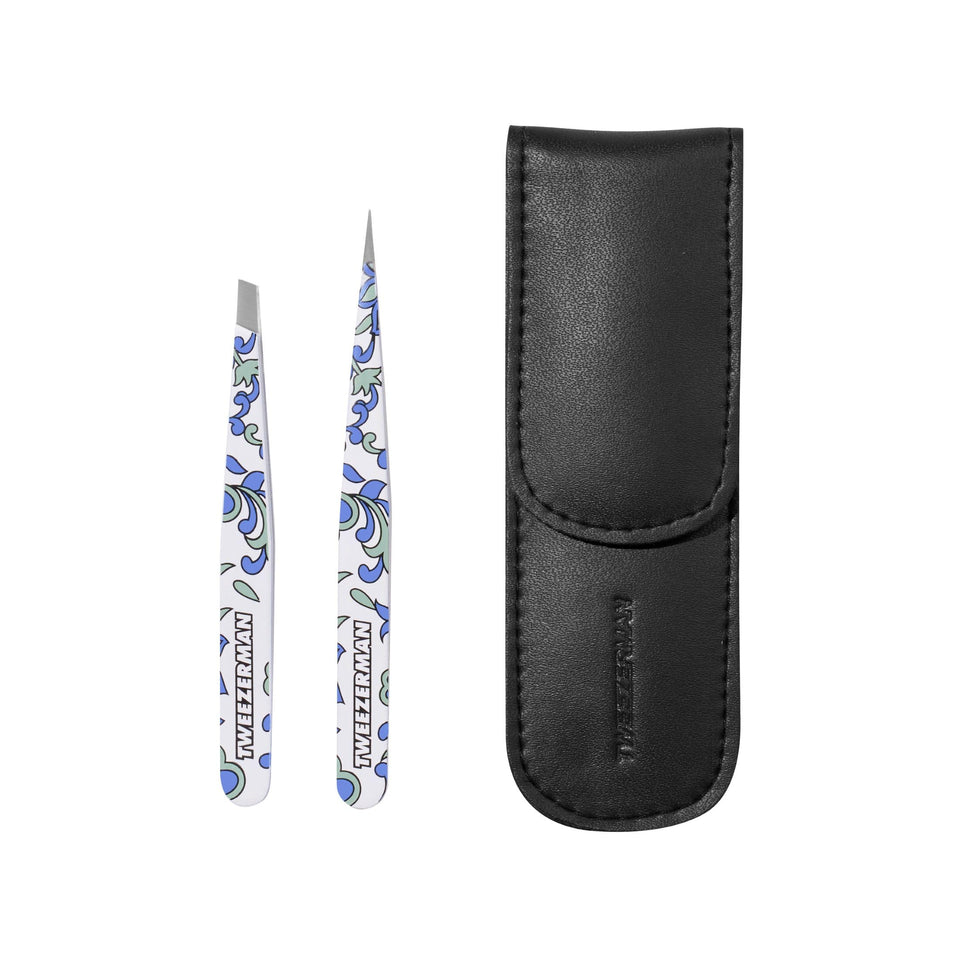 Tweezerman front packaging showing compact tweezer set and travel case for portability