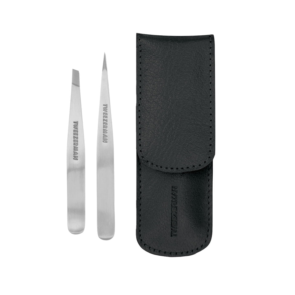 Tweezerman petite set front view showing both tweezers and case for convenient storage and travel
