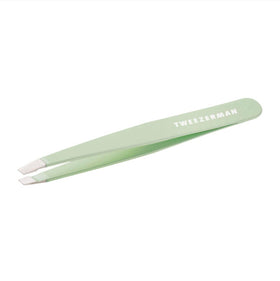 Tweezerman pistachio front view showing sleek tweezer and precise tips for clean shaping