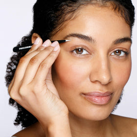 Tweezerman close-up of hand-filed point tips highlighting alignment and precise hair-grabbing ability
