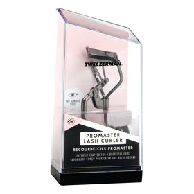 Tweezerman ProMaster in use on an almond-shaped eye lifting lashes without pinching