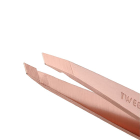 Tweezerman rose gold point tweezer close-up highlighting fine tip for precise ingrown-hair removal