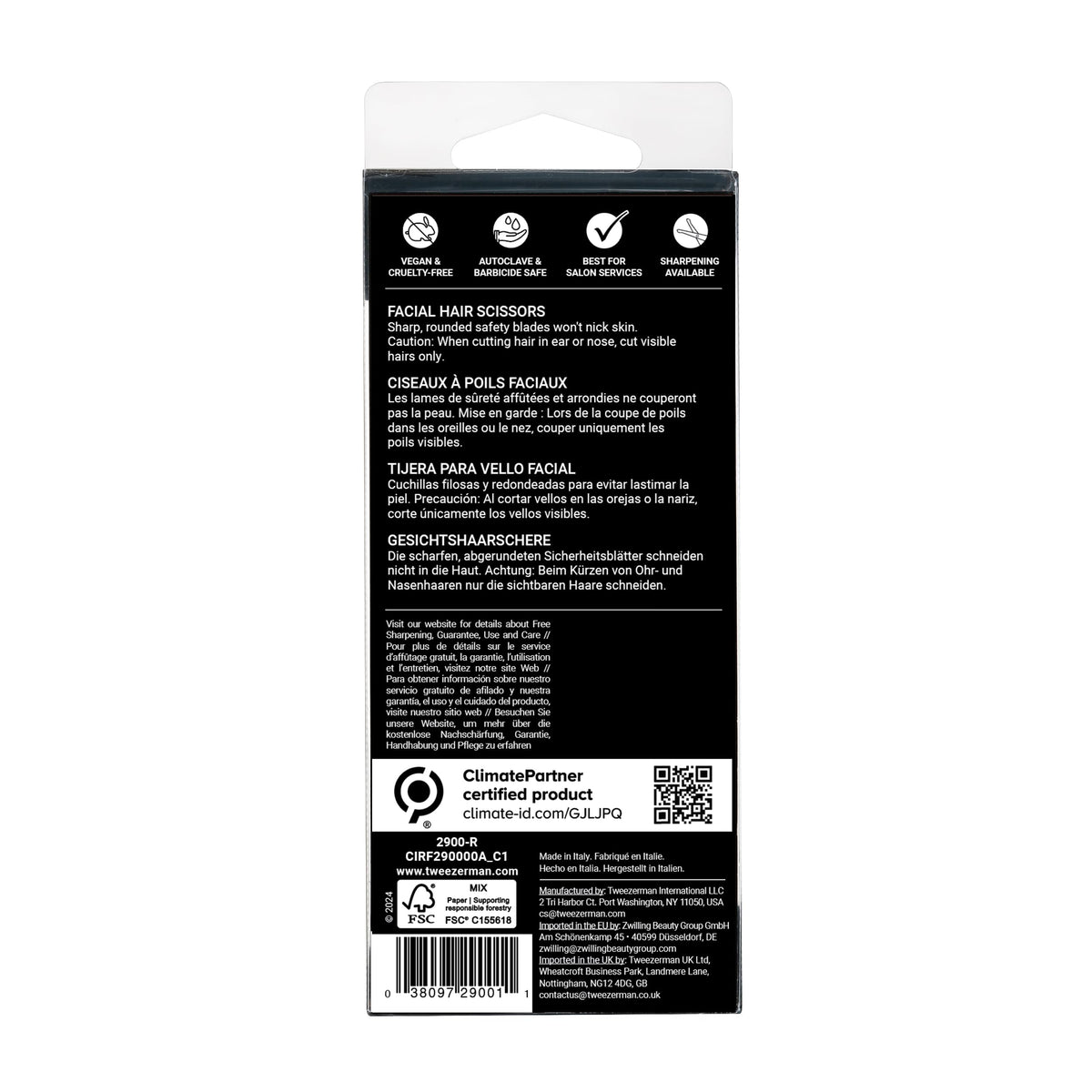 Tweezerman scissors beside a coin showing size and portability for travel convenience