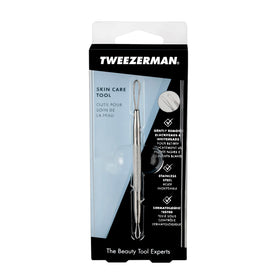 Tweezerman held in hand to show size and scale for easy at‑home facial use