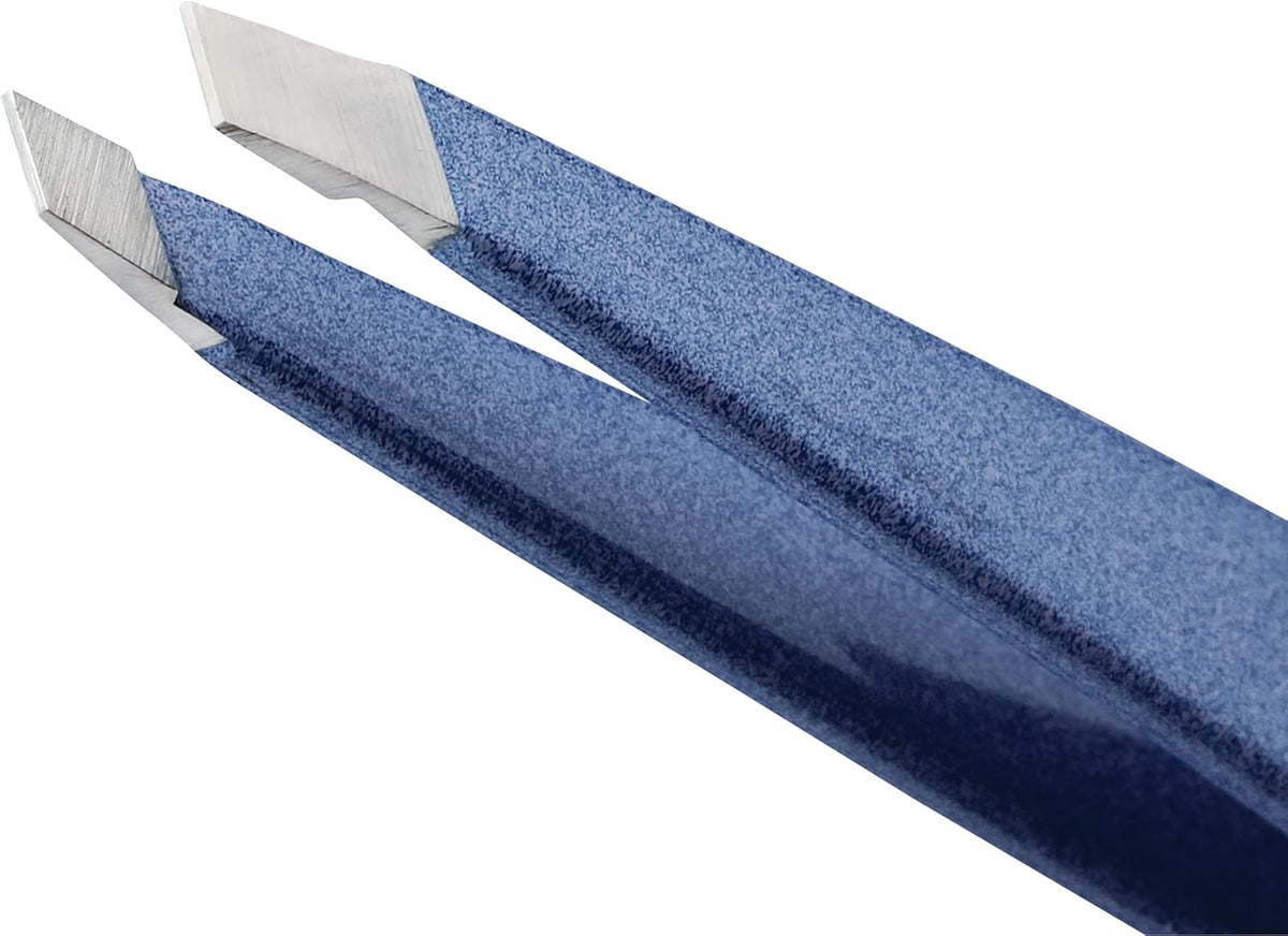 Tweezerman close-up of hand-filed slanted tip demonstrating precise alignment for secure hair removal