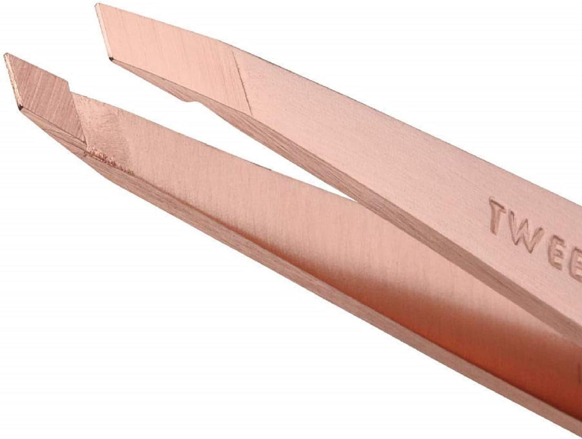 Tweezerman close-up of slant tip highlighting hand-filed alignment for secure grip