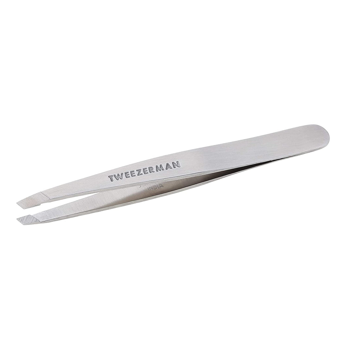 Tweezerman slant tweezer front view showing sleek stainless steel and precision