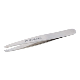 Tweezerman slant tweezer front view showing sleek stainless steel and precision