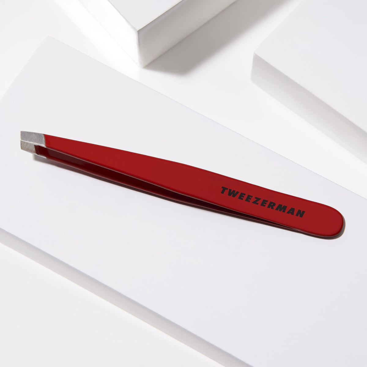 Tweezerman image of hinge and grip showing calibrated tension for comfortable control
