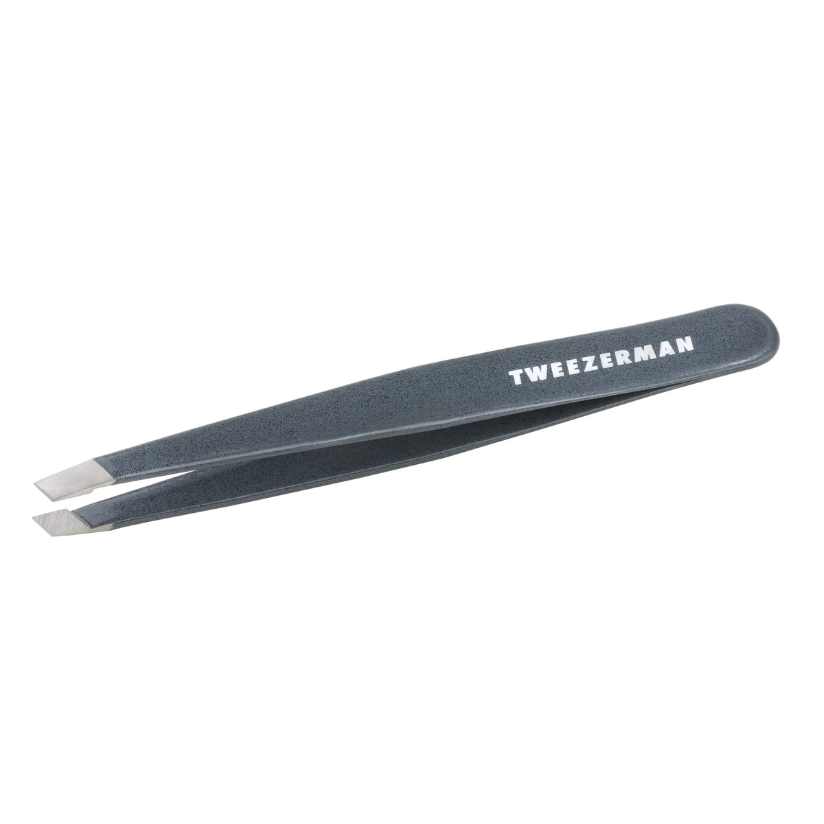Tweezerman tweezer held in hand to show scale and ergonomic grip for steady shaping
