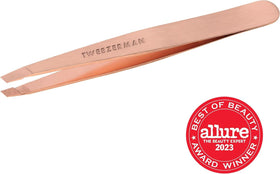 Tweezerman tweezer removing eyebrow hair illustrating accurate single-hair extraction