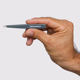 Tweezerman side profile displaying 25-degree slant angle for natural brow access and control