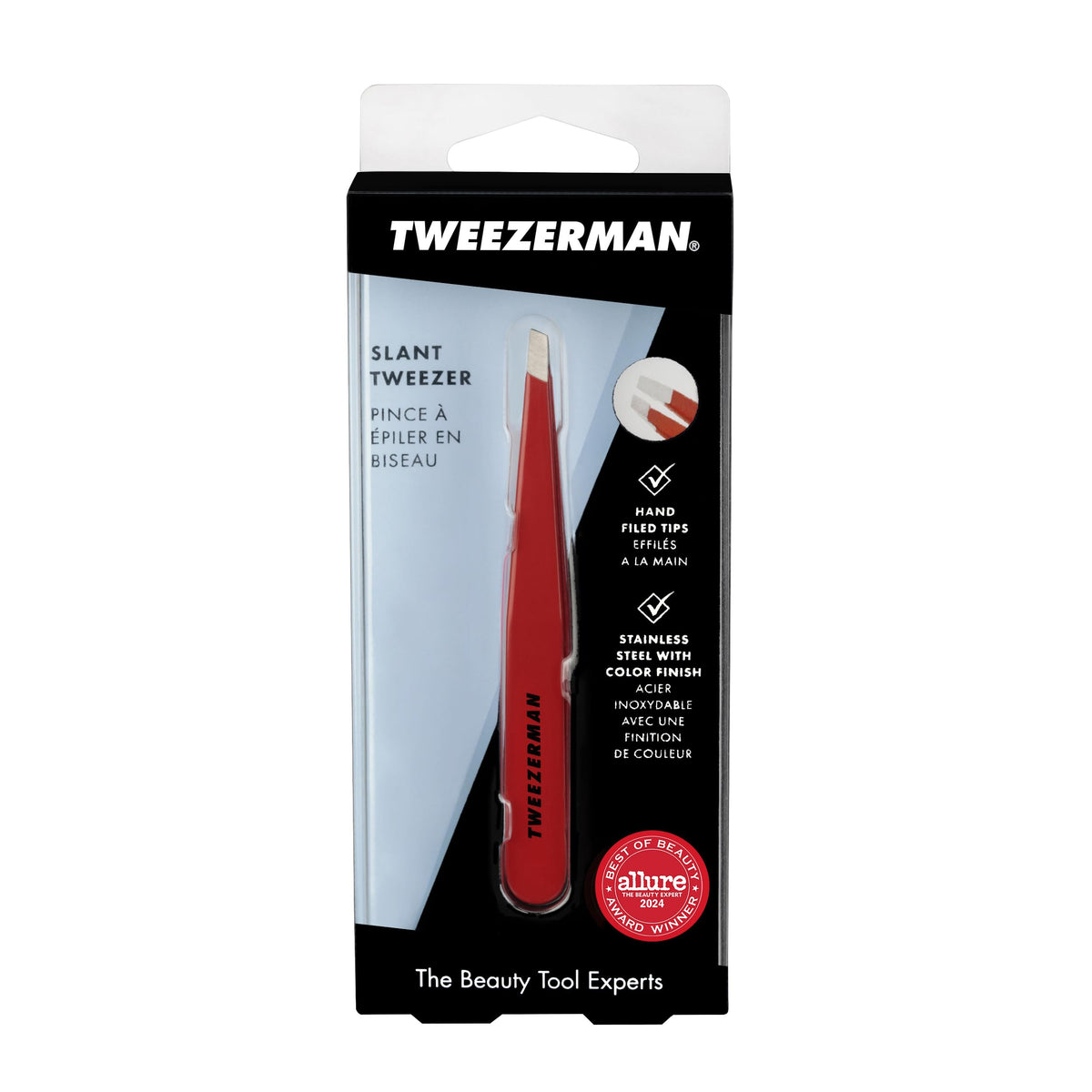 Tweezerman tweezer held in hand for scale, showing compact travel-ready benefit