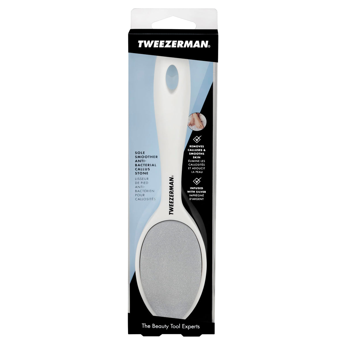 Tweezerman next to a hand for scale to show compact size and travel-friendly benefit