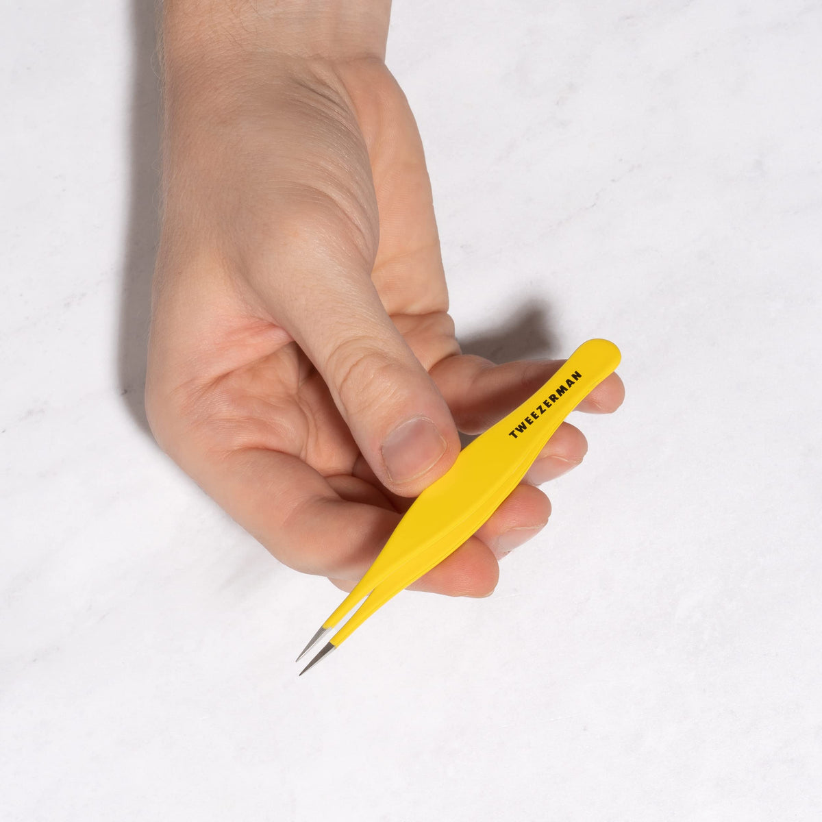 Tweezerman splintertweeze stored inside a compact first aid kit for quick access