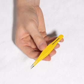 Tweezerman splintertweeze stored inside a compact first aid kit for quick access