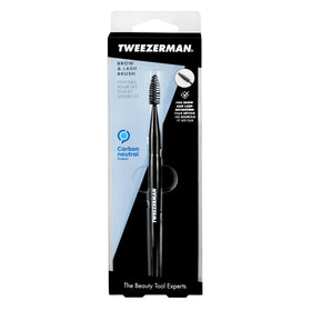 Tweezerman spoolie blending natural and false lashes for seamless finish